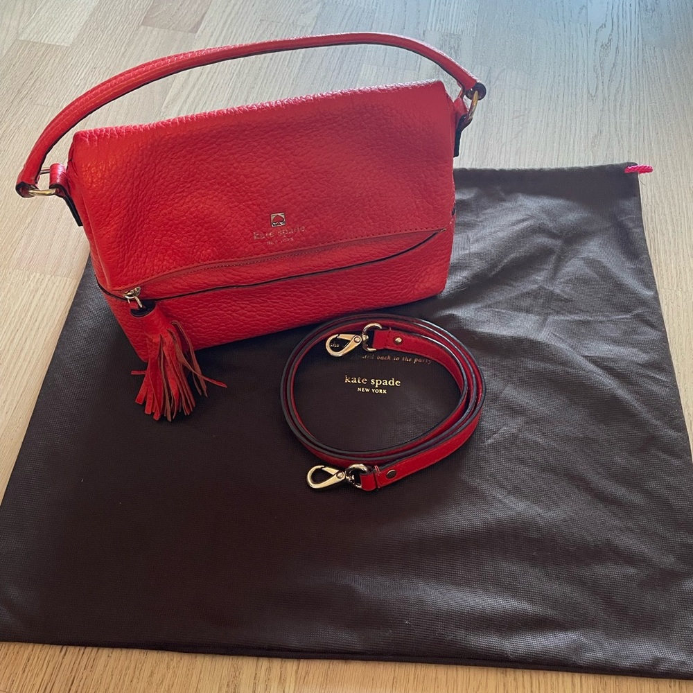 Kate Spade Carmen Southport mini leather crossbody with top handle.